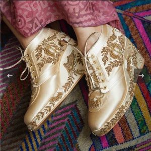 Golden embroidered wedge sneakers